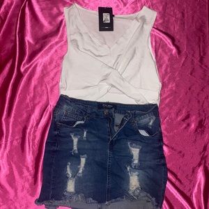 Ripped up blue Jean skirt in medium. XL shirt